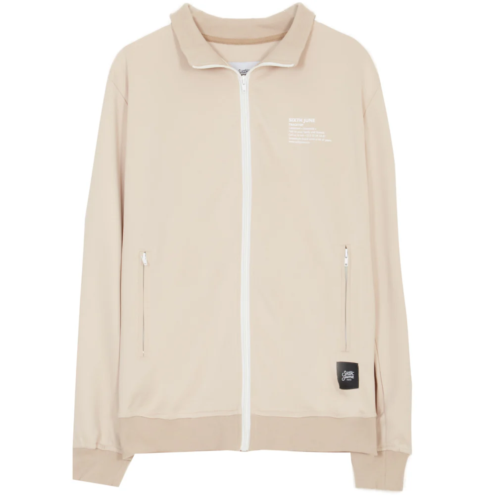 Haut survĂȘtement tracktop beige